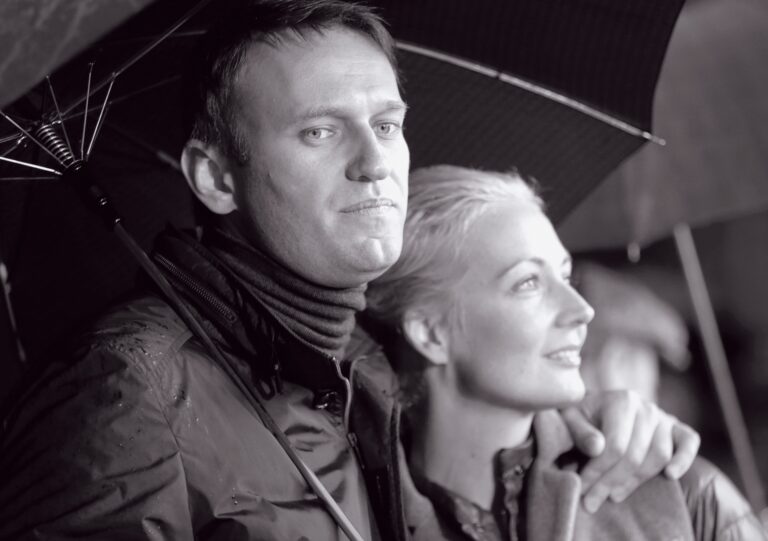 Mayoral candidate and opposition leader Navalny and his wife Yulia look on during a support rally in central Moscow