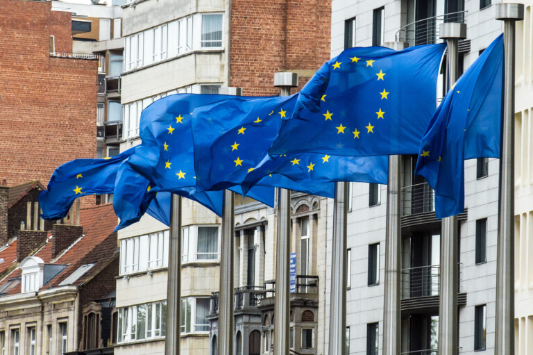 European flags wave at the European Commission headquarters in Brussels, Friday, Oct. 12, 2012. The European Union won the Nobel Peace Prize on Friday for its efforts to promote peace and democracy in Europe, an award given even though the bloc is struggling with its biggest crisis since it was created in the 1950s. (AP Photo/Geert Vanden Wijngaert)