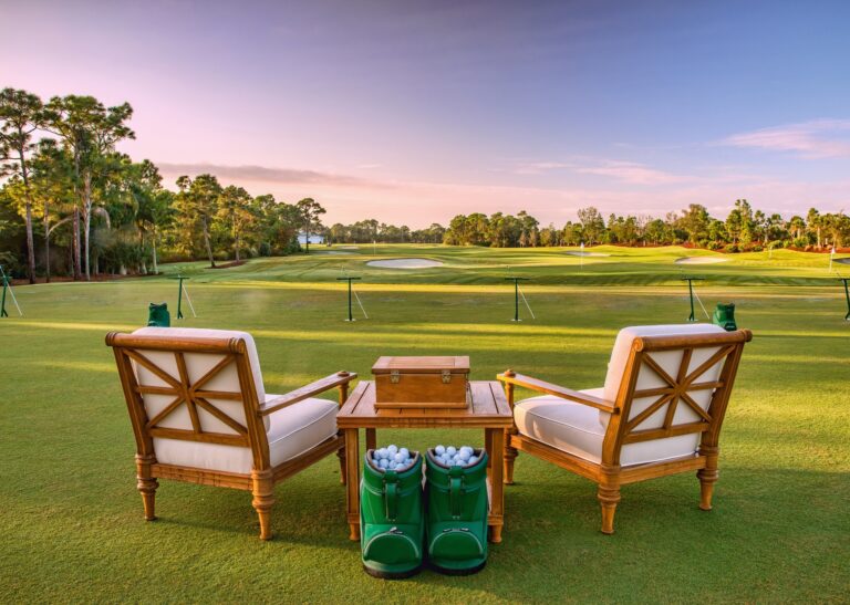 Chairs and golf balls on driving range