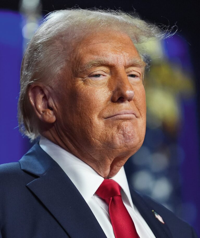 Republican presidential nominee former President Donald Trump arrives at an election night watch party at the Palm Beach Convention Center, Wednesday, Nov. 6, 2024, in West Palm Beach, Fla. (AP Photo/Evan Vucci)