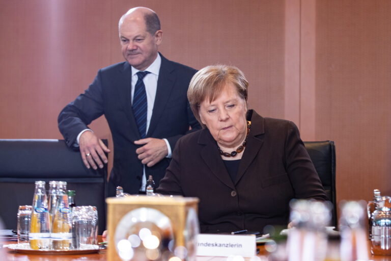 epa08227413 German Minister of Finance Olaf Scholz (L) and German Chancellor Angela Merkel (R) during a cabinet meeting at the German chancellery in Berlin, Germany, 19 February 2020. The cabinet discussed a draft law implementing EU directives on the posting of workers as part of the provision of services, among other issues. EPA/HAYOUNG JEON