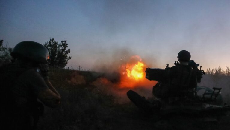 Ukrainian serviceman fires with a ZU-23-2 anti-aircraft cannon at position near a front line in Kharkiv region