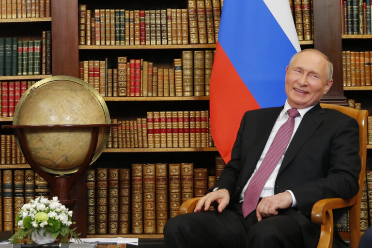 Russia's President Vladimir Putin reacts as he meets U.S. President Joe Biden for the U.S.-Russia summit at Villa La Grange in Geneva, Switzerland, Wednesday, June 16, 2021. (KEYSTONE/REUTERS POOL/Denis Balibouse)