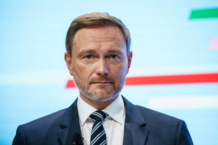 epa09600968 Free Democratic Party (FDP) chairman and faction chairman in the German parliament Bundestag Christian Lindner looks on during the presentation of the coalition contract in Berlin, Germany, 24 November 2021. Members of German parties Social Democrats (SPD), Free Democrats (FDP ) and Greens were leading talks since German federal elections took place on 26 September 2021. On 24 November the participating parties are about to present the result of those talks, and expected coalition contract. EPA/CLEMENS BILAN