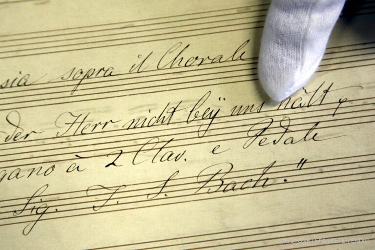 epa01315248 A finger points on the fantasia over the chorale 'Wo Gott, der Herr, nicht bei uns haelt' (If God, the Lord, hold not with us) by Johann Sebastian Bach (1685-1750) in Halle Saale, Germany, 15 April 2008. Musicologists presented the transcript of the composition manufactured by Thomas cantor Wilhelm Rust (1822-1892) in 1877 when a few weeks ago the university's library auctioned a part of Rust's legacy where the composition was discovered in. Only the first five bars of the fantasia, a special genre in organ music, were known to date, with the discovery an enormous enrichment is contributed to the knowledge on Bach's early works. EPA/PETER ENDIG