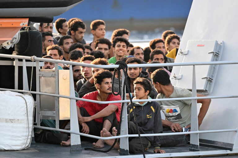 epa10267392 The patrol boat Monte Cimone of the Italian Guardia di Finanza carrying 255 of the 1350 migrants rescued on 25 October in the Mediterranean by units of the GdF, the Coast Guard and Frontex, in Messina, Sicily Island, Italy, 26 October 2022. EPA/CARMELO IMBESI