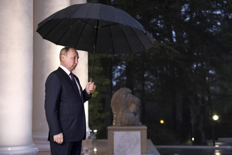 Russian President Vladimir Putin stands waiting to meet Azerbaijan's President Ilham Aliyev prior to their talks in the Bocharov Ruchei residence in the Black Sea resort of Sochi, Russia, Monday, Oct. 31, 2022. (Sergei Bobylev, Sputnik, Kremlin Pool Photo via AP)