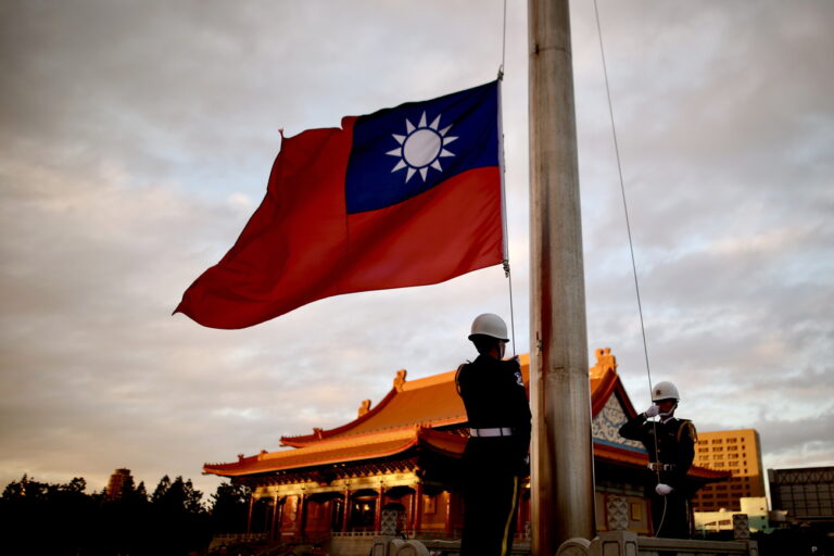 epa11082261 Honor guards lower down the flag of Taiwan in Liberty Square in Taipei, Taiwan, 16 January 2024. The recent visit of former US officials to Taiwan was aimed at offering post-election talks and demonstrating cross-party support for bilateral ties, the chair of the American Institute in Taiwan (AIT) said. The US Department of State, in a congratulatory note to Lai Ching-te on his victory in Taiwan's presidential election, said that the United States is committed to 'maintaining cross-Strait peace and stability' and work with Taiwan leadership by observing their longstanding unofficial relationship, consistent with the US one China policy. China has condemned foreign governments that congratulated the island's president-elect and strongly opposed the US having any form of official interaction with Taiwan following the recently concluded elections. EPA/RITCHIE B. TONGO