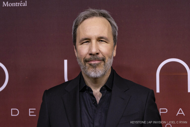 Director Denis Villeneuve poses as he arrives at the premiere of 