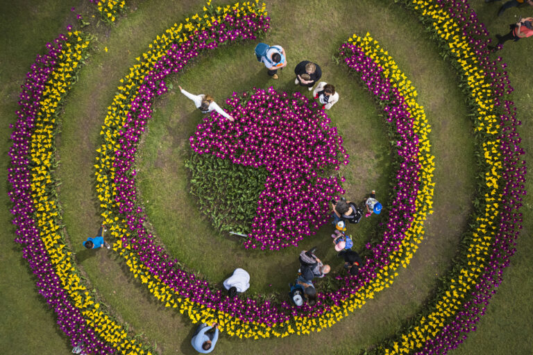 People enjoy the unusually warm weather for the month of April, with several regions of Switzerland experiencing over 25 degrees over the week-end, as they gather to see over 140'000 tulips of more than 350 varieties in full bloom at the tulip festival in the 