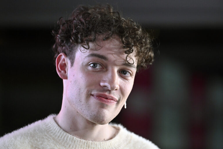 Swiss Singer Nemo, winner of the 68th edition of the Eurovision Song Contest (ESC), speaks during a press conference after arriving in Zurich, Switzerland, Sunday, May 12, 2024.(KEYSTONE/Walter Bieri) .