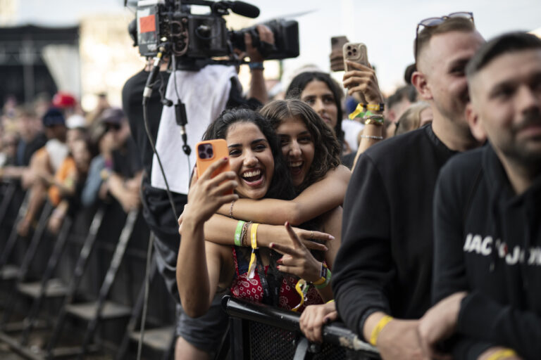 Fans cheer at the Openair Frauenfeld music festival, on Saturday, July 13, 2024, in Frauenfeld, Switzerland. (KEYSTONE/Gian Ehrenzeller)