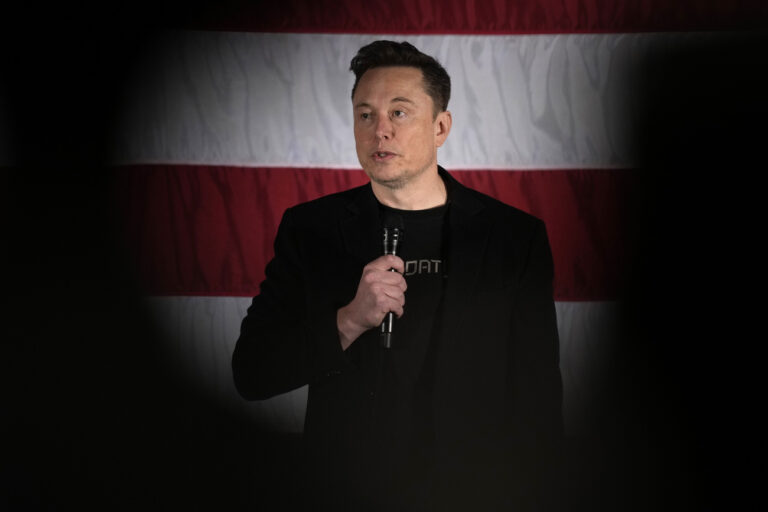 Elon Musk speaks as part of a campaign town hall in support of Republican presidential nominee former President Donald Trump in Folsom, Pa., Thursday, Oct. 17, 2024. (AP Photo/Matt Rourke)