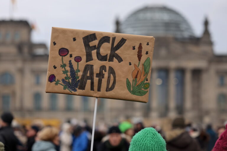 epa11870148 Protesters gather during a rally in front of the Reichstag building in Berlin, Germany, 02 February 2025. People gathered to protest against the Christian Democratic Union's (CDU) cooperation with the far-right Alternative for Germany (AfD) party, after the CDU's motion in the Budestag won a majority with the help of AfD votes. This is a novelty, as the CDU wanted to maintain a so-called 