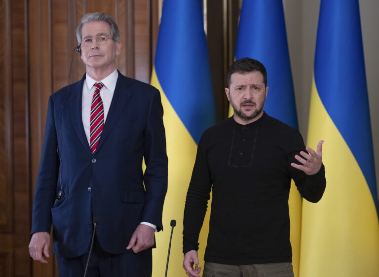 epa11891356 Ukrainian President Volodymyr Zelensky (R) speaks to the press during his meeting with US Treasury Secretary Scott Bessent (L) in Kyiv, Ukraine, 12 February 2025. EPA/STRINGER