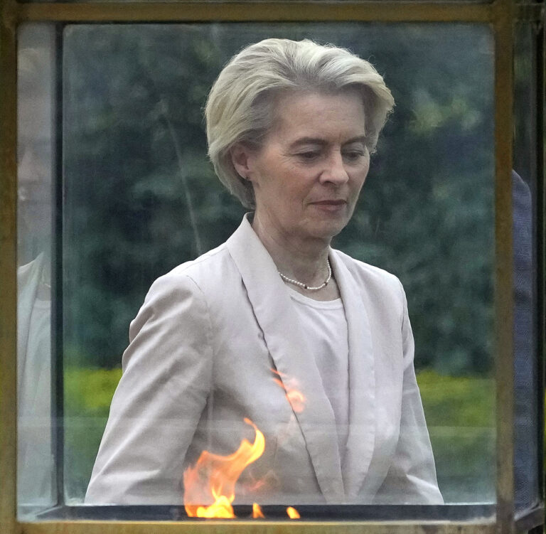 European Commission President Ursula von der Leyen offers her tributes at Rajghat, the Mahatma Gandhi memorial, in New Delhi, India, Thursday, Feb. 27, 2025. (AP Photo/Manish Swarup)