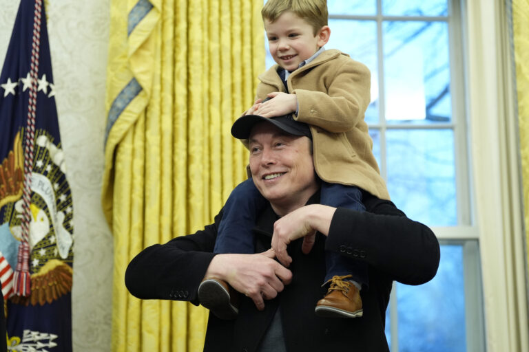 Elon Musk, joined by his son X Æ A-Xii, speaks in the Oval Office at the White House, Tuesday, Feb. 11, 2025, in Washington, during an event with President Donald Trump. (Photo/Alex Brandon)