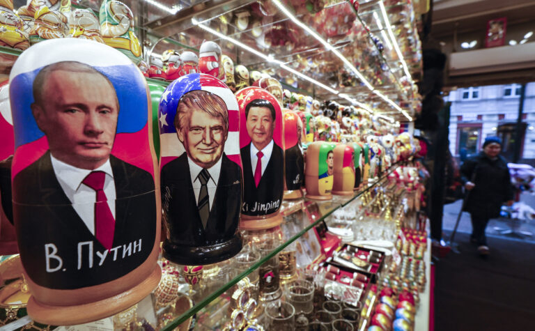 epa11704994 Traditional Russian Matryoshka wooden dolls, also known as nesting dolls, depicting US Republican presidential candidate Donald J. Trump (C), Russian President Vladimir Putin (L) and Chinese President Xi Jinping (R) are on display at a gift shop in Moscow, Russia, 06 November 2024. US Republican presidential candidate Donald J. Trump has been elected the 47th president of the United States after having secured more than the 270 Electoral College votes necessary, following a tightly contested race with Democratic presidential candidate US Vice President Kamala Harris.  EPA/YURI KOCHETKOV