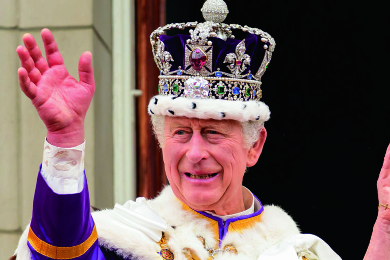 Britain's King Charles III and Queen Camilla wave to the crowds from the balcony of the Buckingham Palace after their coronation, in London, Saturday, May 6, 2023. (Leon Neal/Pool Photo via AP)