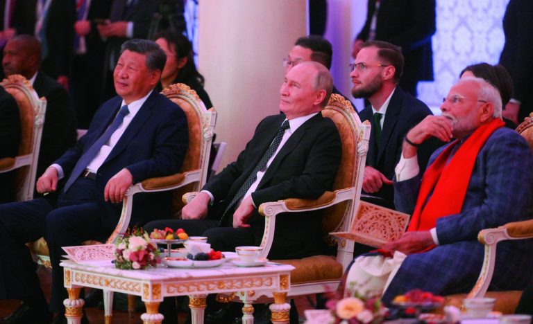 epa11675993 A handout photo made available by photo host brics-russia2024.ru shows Chinese President Xi Jinping (L), Russian President Vladimir Putin (C) and Indian Prime Minister Narendra Modi (R) attending a concert before an informal dinner on the sidelines of the BRICS Summit in Kazan, Russia, 22 October 2024. The BRICS summit takes place from 22 to 24 October and is expected to be the largest foreign policy event ever held in Russia.  EPA/Alexandr Kryazhev / PHOTO HOST BRICS-RUSSIA2024.RU HANDOUT  
HANDOUT EDITORIAL USE ONLY/NO SALES